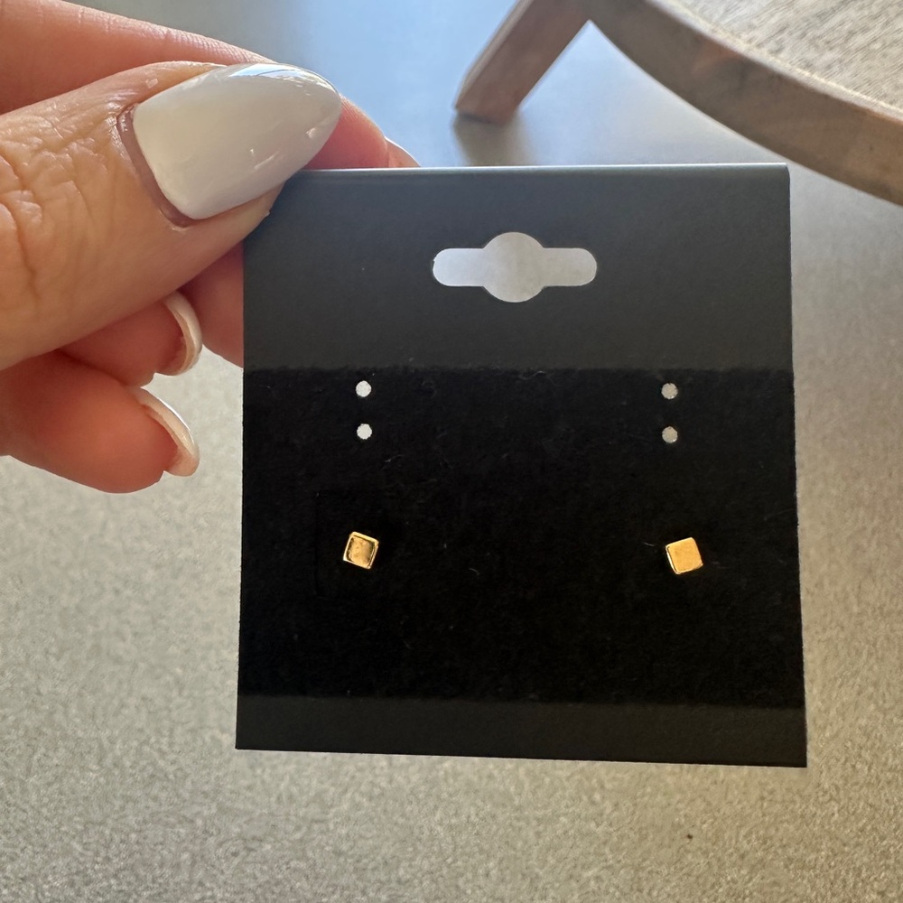 Solid 14k gold cube studs with screw back. Never worn